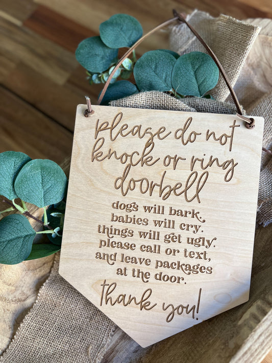 Door Hanger Humorous "Do Not Knock or Ring Doorbell" Door Sign – Laser Engraved Maple Wood – Leather Cord Hanger – Privacy Reminder